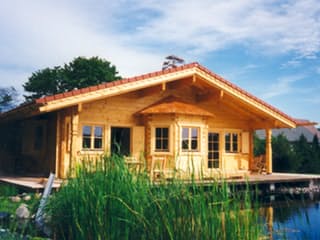 Fertighaus Variantenhaus von TIROLIA Ausbauhaus ab 103780€, Blockhaus Außenansicht 4