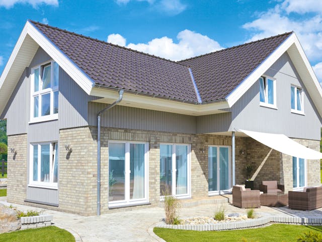 Fertighaus Westerland - Winkelhaus im Landhausstil von Danhaus Deutschland Schlüsselfertig ab 474901€, Außenansicht 2