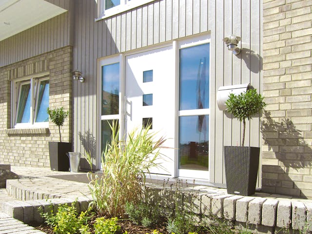 Fertighaus Westerland - Winkelhaus im Landhausstil von Danhaus Deutschland Schlüsselfertig ab 474901€, Außenansicht 3