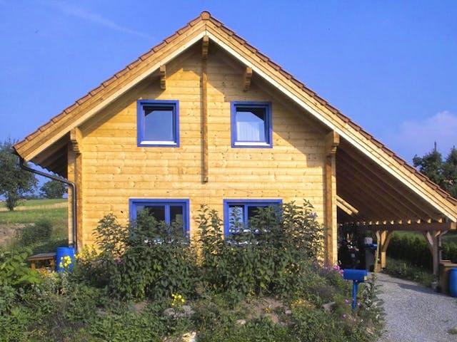 Blockhaus Wolfenbrück von Rems-Murr-Holzhaus Ausbauhaus ab 220880€, Blockhaus Außenansicht 3