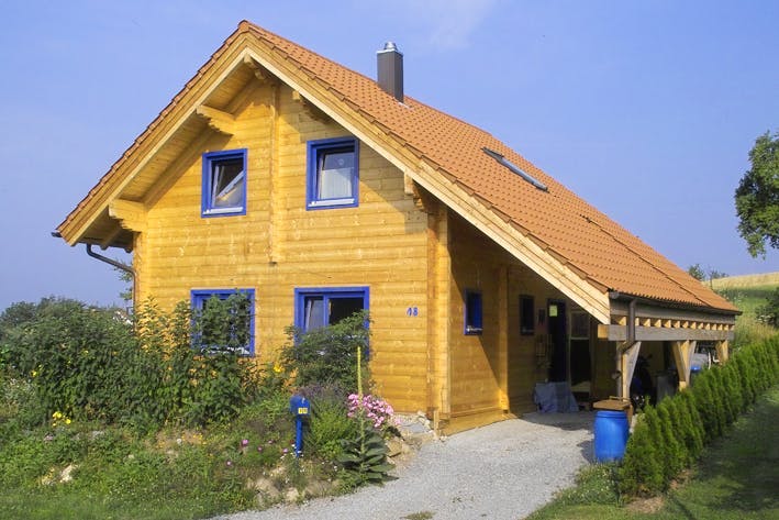 Blockhaus Wolfenbrück von Rems-Murr-Holzhaus Schlüsselfertig ab 393000€, Blockhaus Außenansicht 1