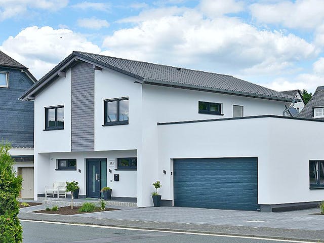 Fertighaus Haus Nübold-Bracht von Wiese und Heckmann, Satteldach-Klassiker Außenansicht 2