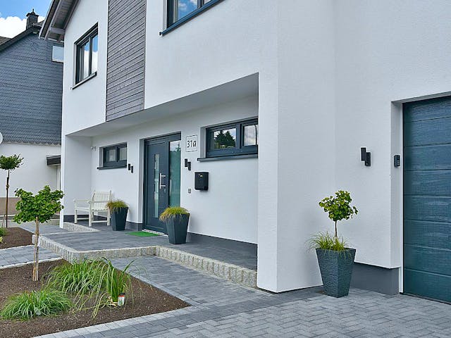 Fertighaus Haus Nübold-Bracht von Wiese und Heckmann, Satteldach-Klassiker Außenansicht 4