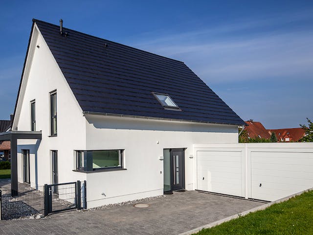Massivhaus Kundenhaus Erdmann von Zaunmüller Massivhaus, Satteldach-Klassiker Außenansicht 1