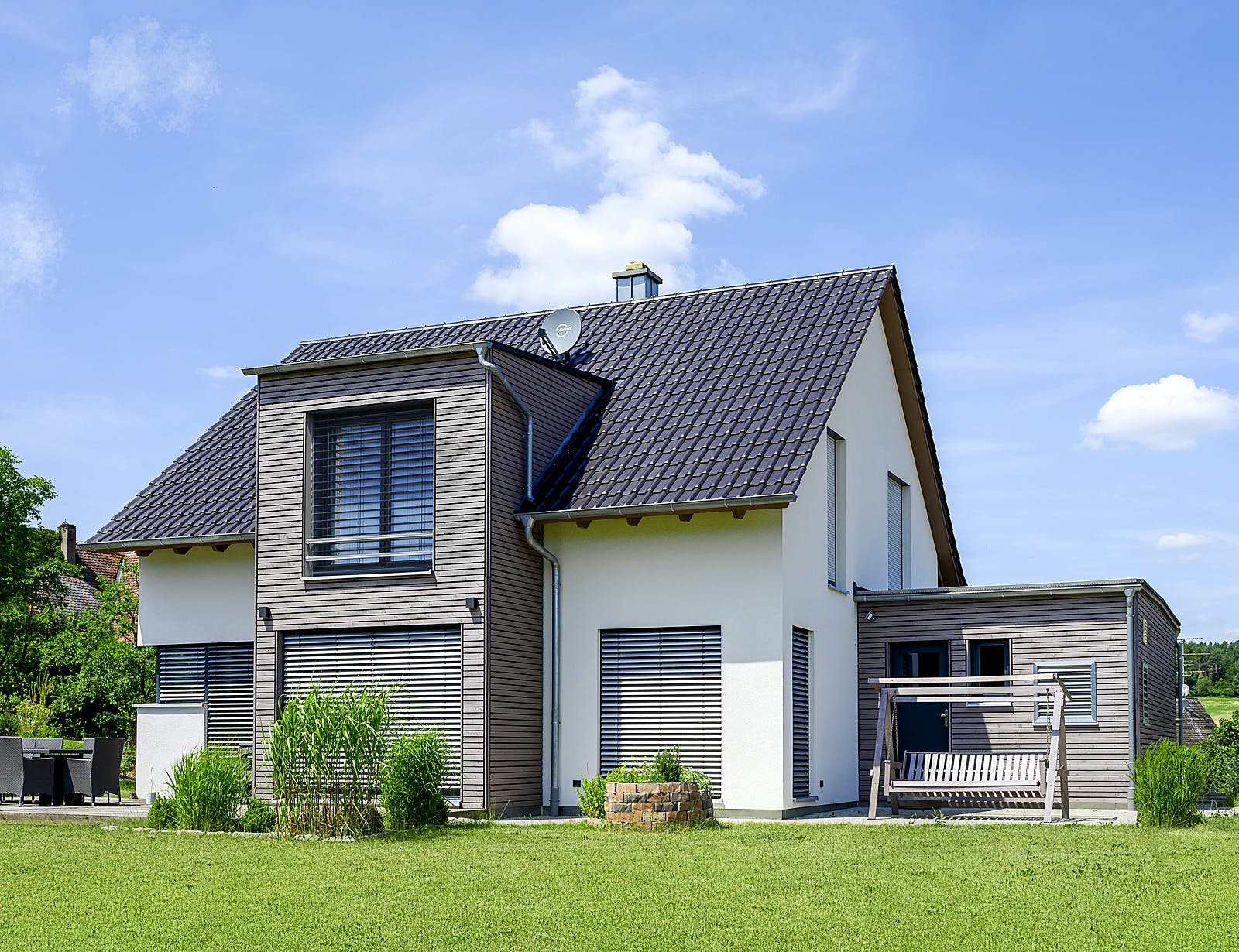 Fertighaus Einfamilienhaus mit Carport von Ziegler Haus Schlüsselfertig ab 290000€, Satteldach-Klassiker Außenansicht 1